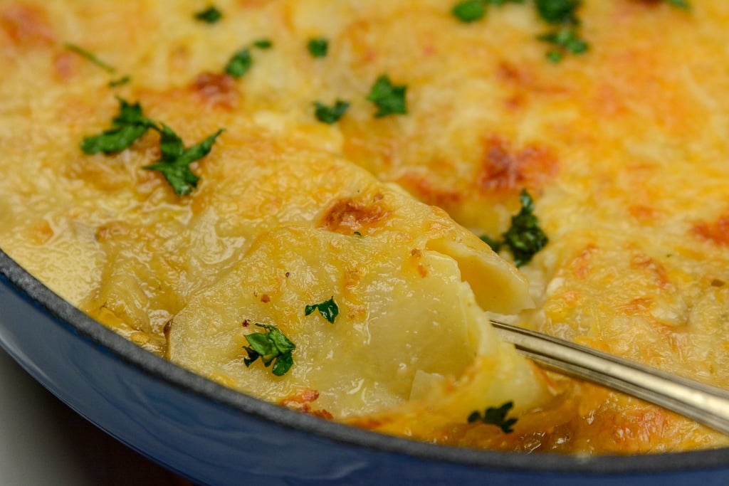 Spoon-in-the-pan-of-Au-gratin-Potatoes.