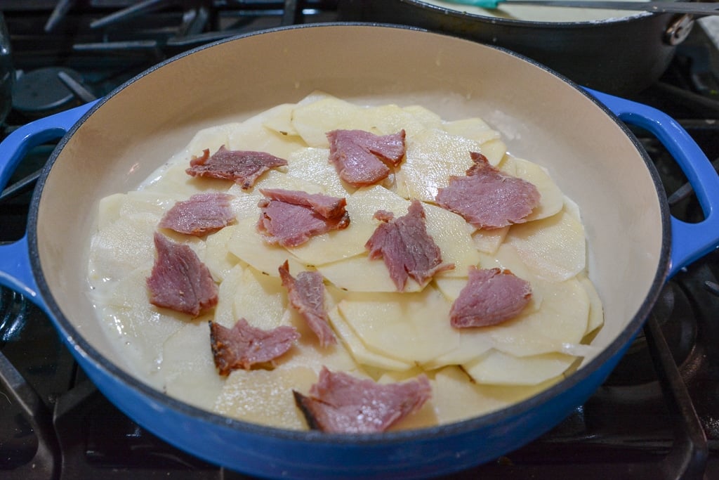 layer-of-ham-and-potatoes-in-casserole-dish