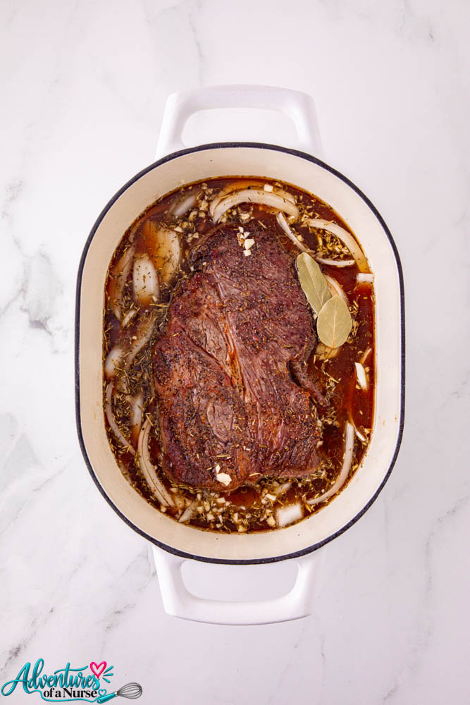 add liquid to the dutch oven