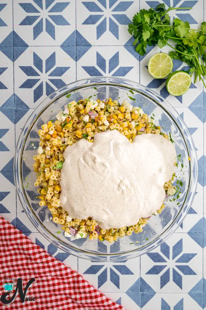 Pour-dressing-over-salad.