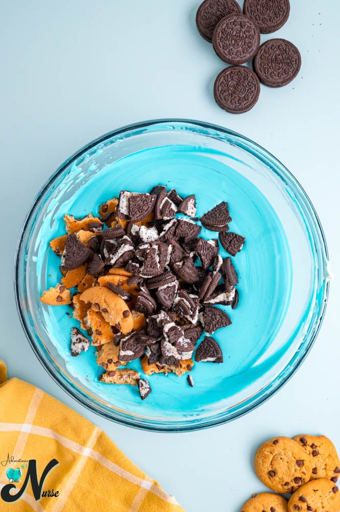Add-the-chopped-Oreos-and-Chewy-Chips-Ahoy-cookies-to-the-mixture