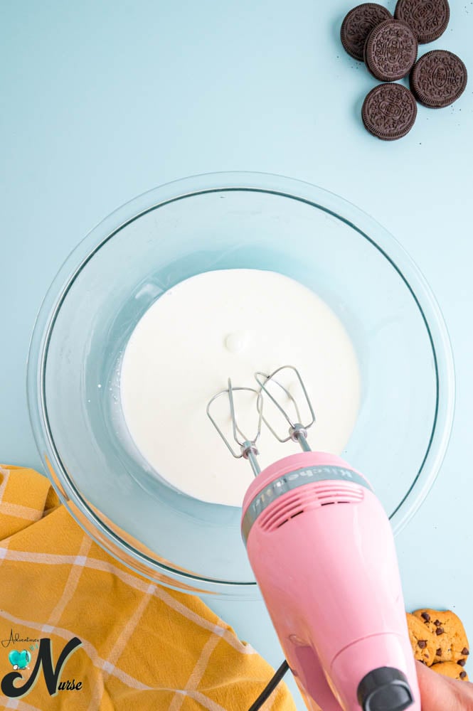 In-a-large-mixing-bowl-whip-the-heavy-whipping-cream-using-a-hand-or-stand-mixer.jpg