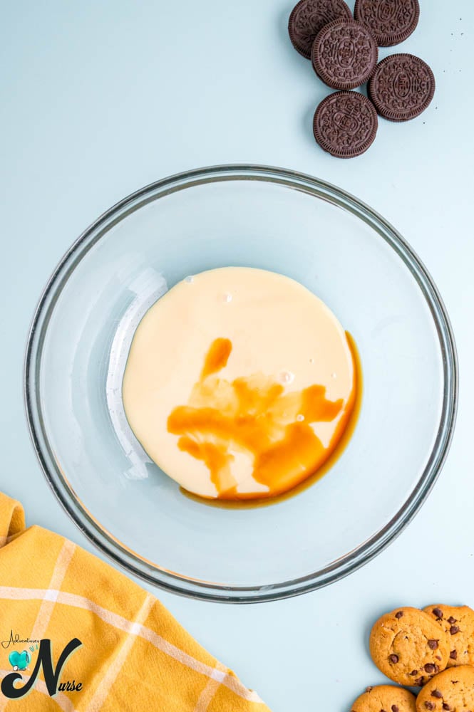 In-a-separate-bowl-stir-together-the-sweetened-condensed-milk-and-vanilla-extract.