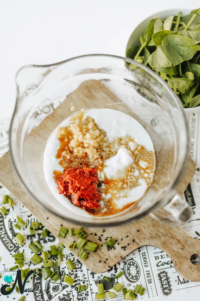 Add-seasonings-to-bowl.