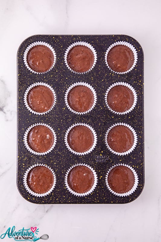 cupcake mix in cupcake pan