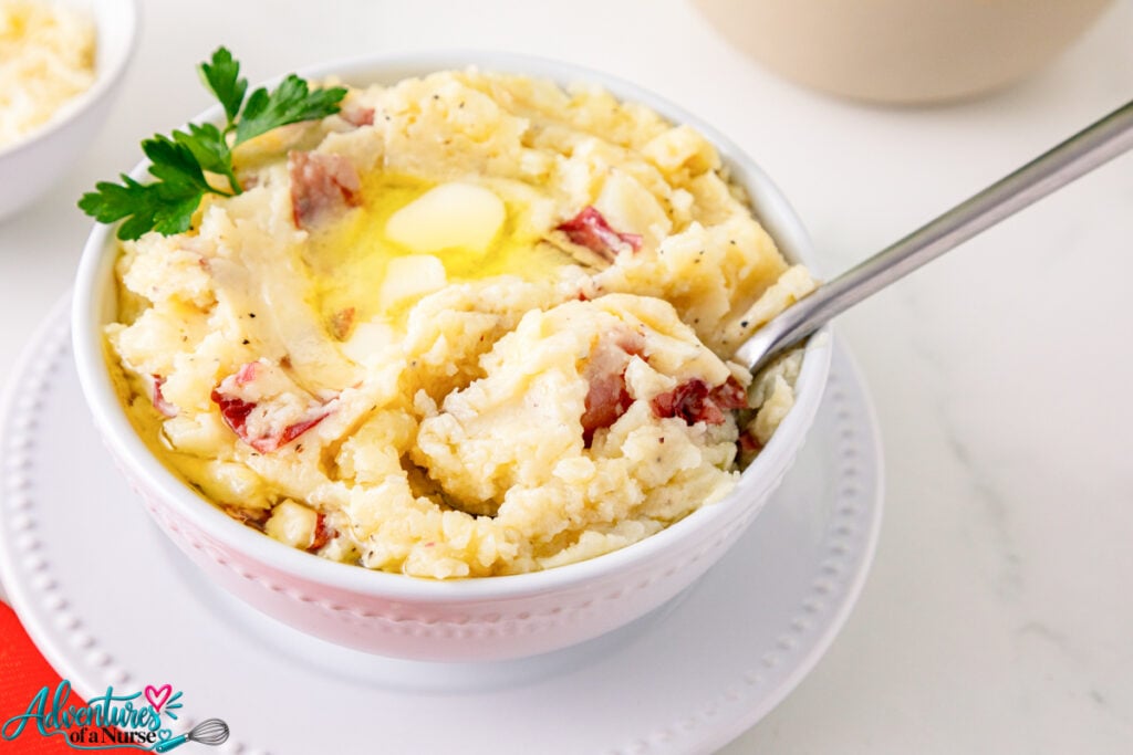 mashed red skin potatoes on a spoon