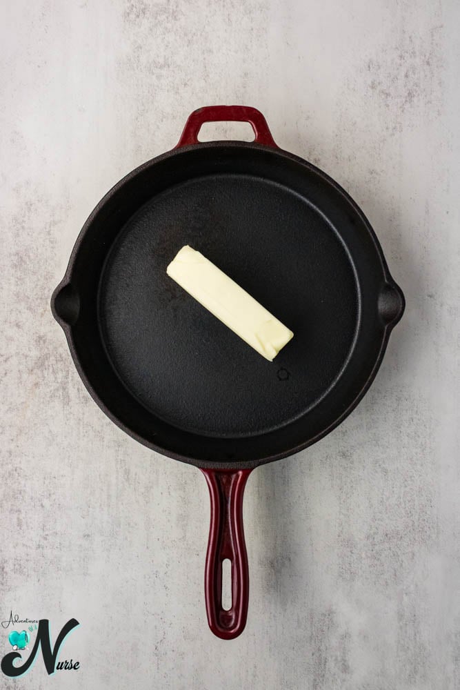 Melt butter in cast iron skillet