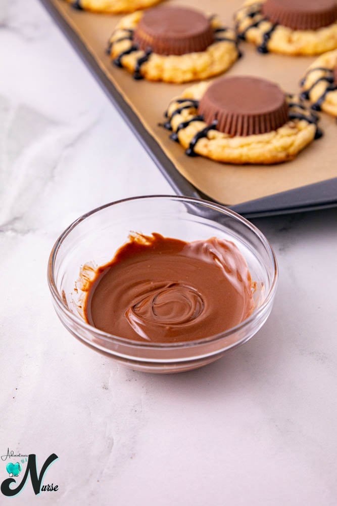 melt chocolate to attach eyes
